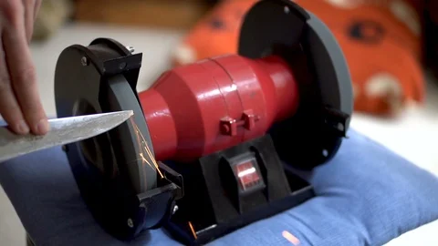 Blade Sharpening Grinding Machine - four times slow motion Stock Footage 129635426