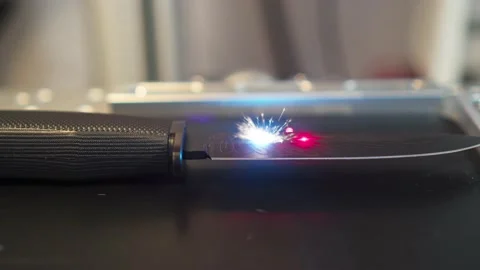 Blade surface of black weapon gift knife under laser engraving process, camera Stock Footage 204036739