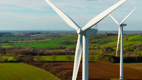 Blade wind turbine rotating. Wind turbine operating to support clean electricity Stock Footage 328359210