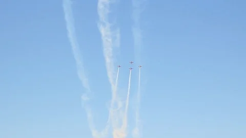 The Blades aerobatic team loop the lop in formation in Extra E-A 300 aircraft Stock Footage 117546440