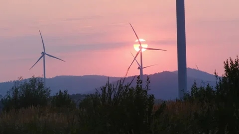 Blades of turbines turn smoothly producing energy for region 스톡 동영상 323730077