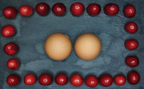 Blaming on a black background with eggshells Stock Photos