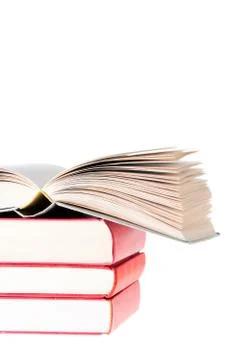 Blanc book open over tree red books Stock Photos