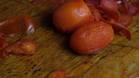Blanched tomatoes with the skins removed ready for canning Video stock 138463649