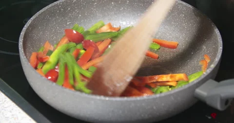 Blanching Peppers in a Pan Stock Footage 304880460
