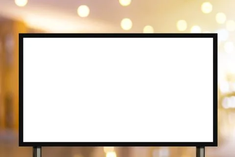 Blank advertising billboard or wide screen television with blurred shopping m Stock Photos
