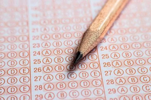 Blank answer sheet with pencil close up Stock Photos