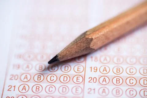 Blank answer sheet with pencil close up Stock Photos
