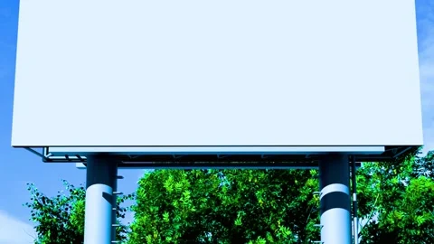 Blank billboard mock up template standing against blue sky and green trees Stock-Footage 341801510