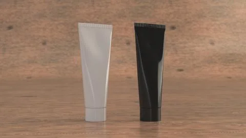 Blank black and white tubes of toothpaste, cream or gel Illustrazione stock