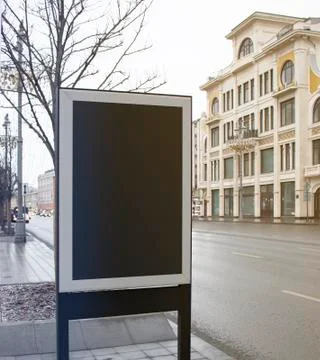 Blank black rectangular pylon stand on street mockup, side view 스톡 사진