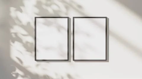 Blank black vertical frames mock up with leaves shadows and sunlight on white Stock-Illustration