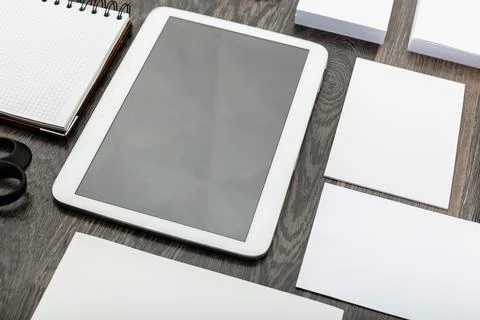 Blank branding elements, mock up with digital tablet, top view Stock Photos