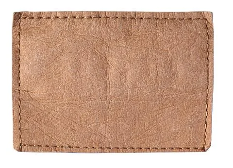 Blank brown leather patch with stitches on transparent background Stock Photos