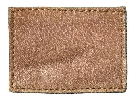 Blank brown leather patch with stitching for branding Stock Photos
