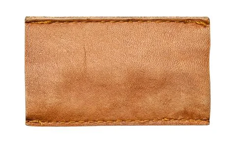 Blank brown leather patch with stitching for branding Stock Photos