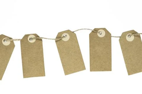 Blank brown note cards with copy space stuffed on brown rope Stock Photos