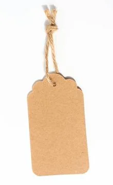 Blank brown rectangular brown paper tag on a rope on white background, tem... Foto stock