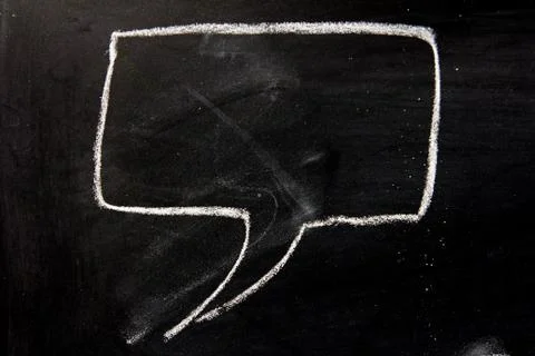 Blank bubble speec as comic dialog on blackboard background Stock Photos