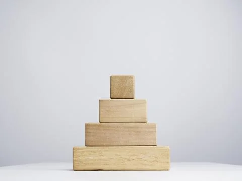 Blank business chart steps made by stack of wooden cube blocks. Stock Photos