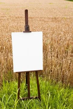 Blank canvas on an easel Stock Photos