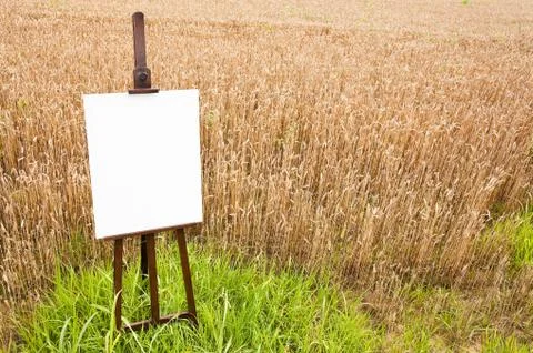 Blank canvas on an easel Stock Photos