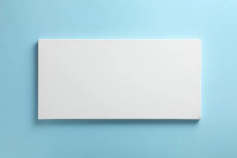 Blank canvas on light blue background, space for text Stockfoto's