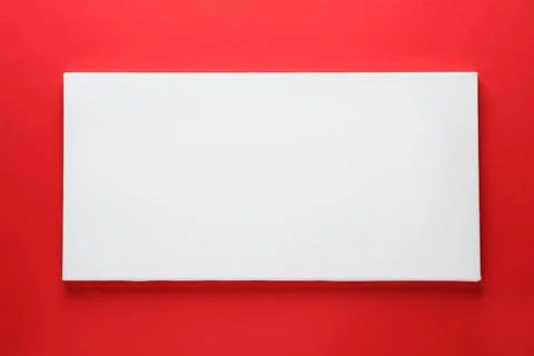 Blank canvas on red background, space for text Stockfoto's