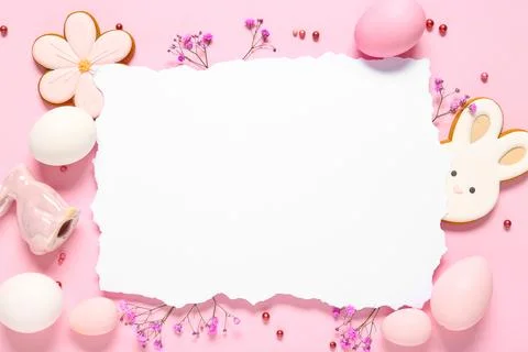 Blank card with Easter eggs, cookies, ceramic bunny and gypsophila flowers on Stock Photos