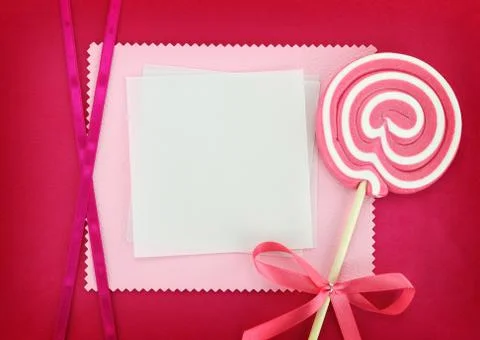 Blank card with lollipop on pink background Stock Photos
