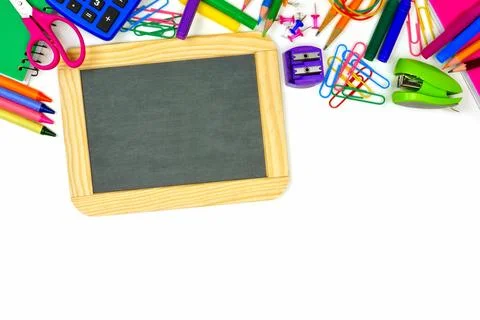 Blank chalkboard on a white background with school supplies top border Stock Photos