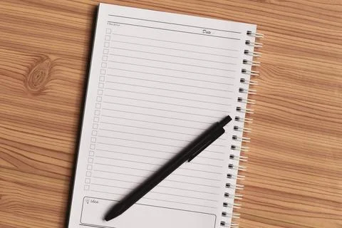 Blank checklist with space for ticks on notepad with wooden background. Stock Photos