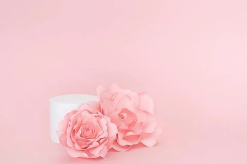Blank circular platform for product presentation with paper roses Stock Photos