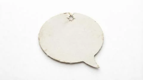 Blank circular speech bubble tag with hole for hanging isolated on white ba.. Stock Photos