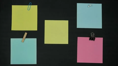 Blank colored sticky notes on a black background Stock-Footage 297398159
