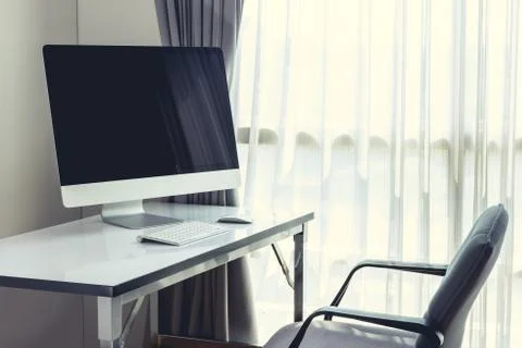 Blank computer desktop with keyboard, diary and other accesories on white tab Foto stock