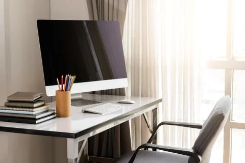 Blank computer desktop with keyboard, diary and other accesories on white tab Foto stock