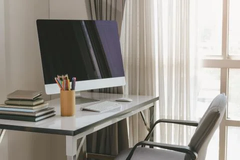 Blank computer desktop with keyboard, diary and other accesories on white tab Stock Photos