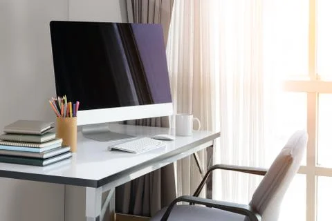 Blank computer desktop with keyboard, diary and other accesories on white tab Stock Photos