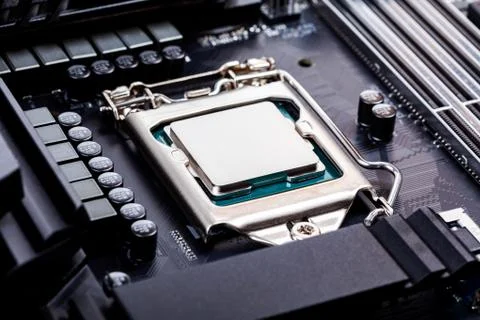 Blank CPU lid top, socket cover view angle processor placed and locked in 写真素材