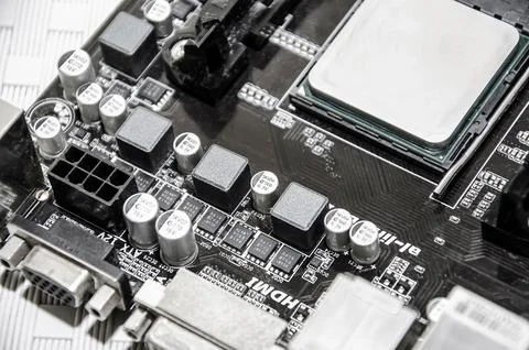 Blank CPU lid top, socket cover view angle processor placed and locked in the Stock Photos