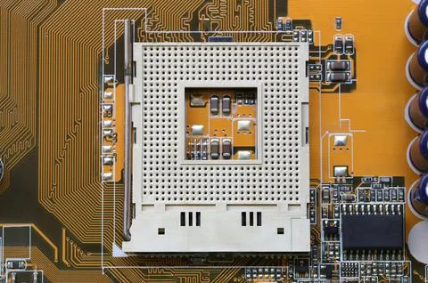 Blank CPU socket on mainboard background. Stock Photos