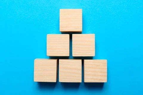 Blank cubes on light blue background, flat lay with space for text. Idea co.. Stock Photos