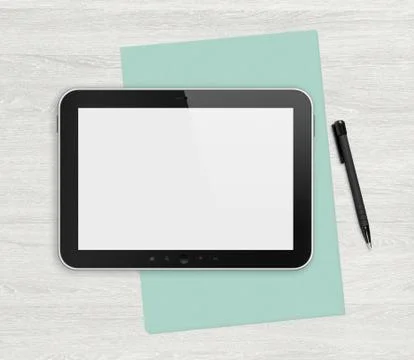 Blank digital tablet on a white desk Stock Photos