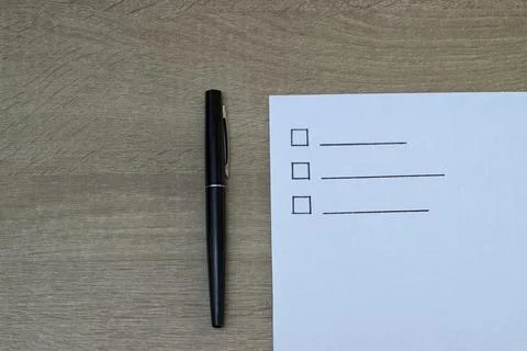 Blank to-do list with checkboxes and black pen Stock Photos