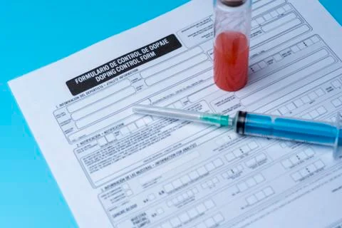 Blank doping control, syringe and blood close-up. Stock Photos