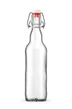 Blank empty clear bottle with vintage swing top isolated on white. Stock Photos