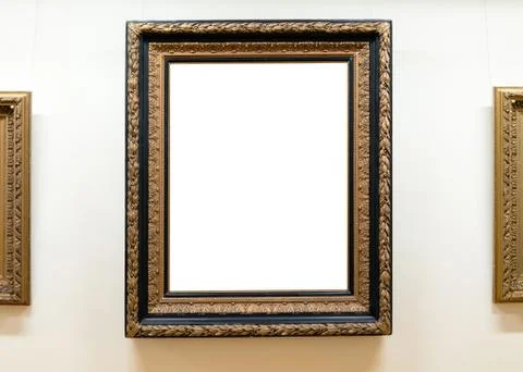 Blank empty frames hanging on museum wall. Art gallery, museum exhibition Stock Photos