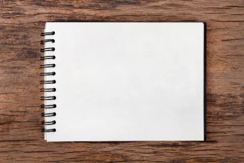 Blank empty notepad on wood background Stock Photos