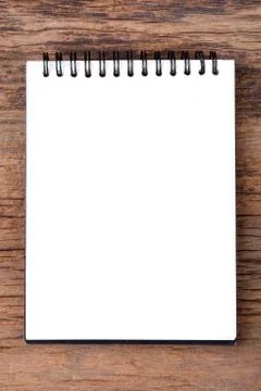 Blank empty notepad on wood background Stock-Fotos